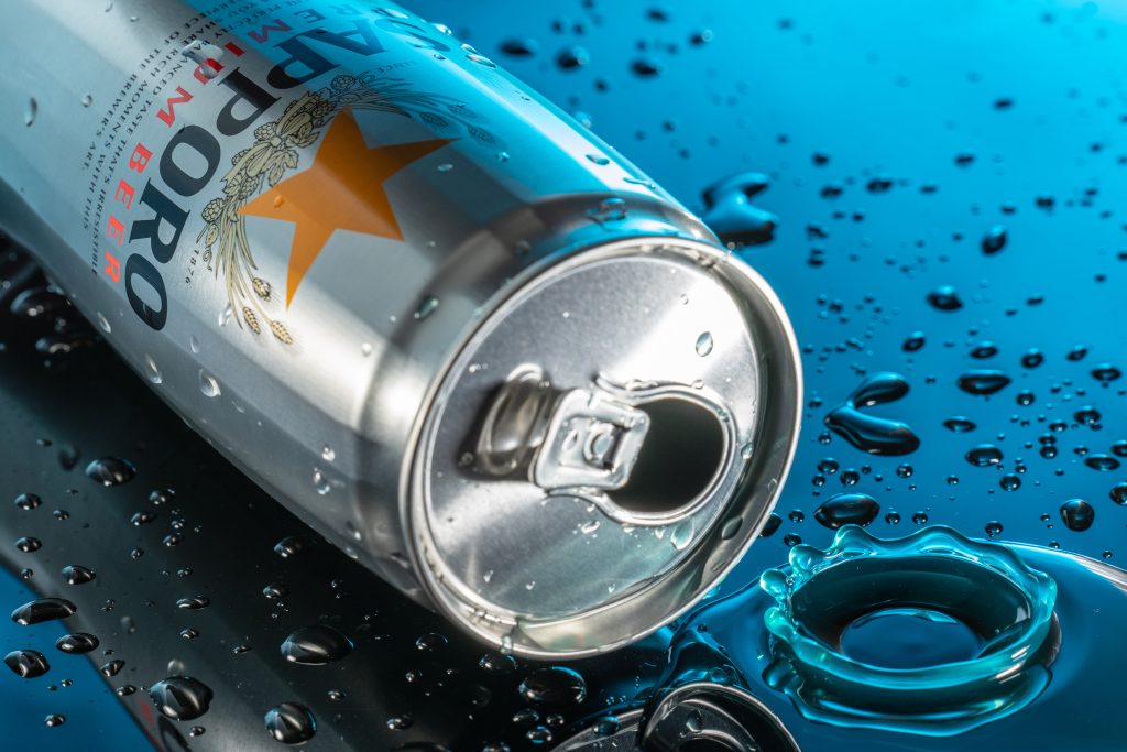 beer can lying on a flat surface