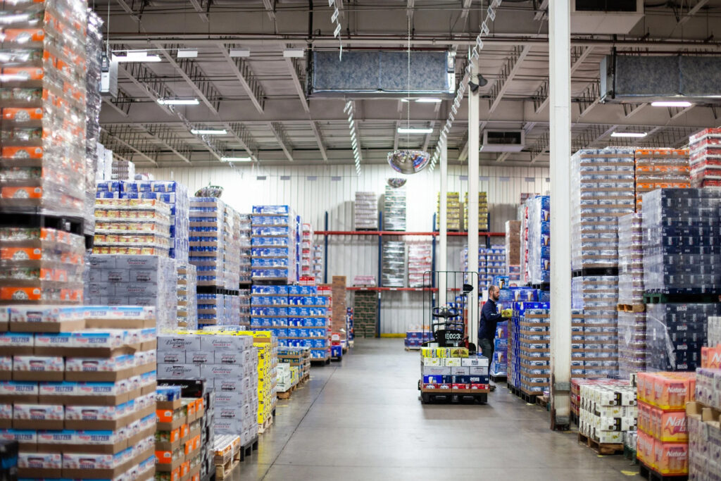 warehouse showing pallets full of beer boxes