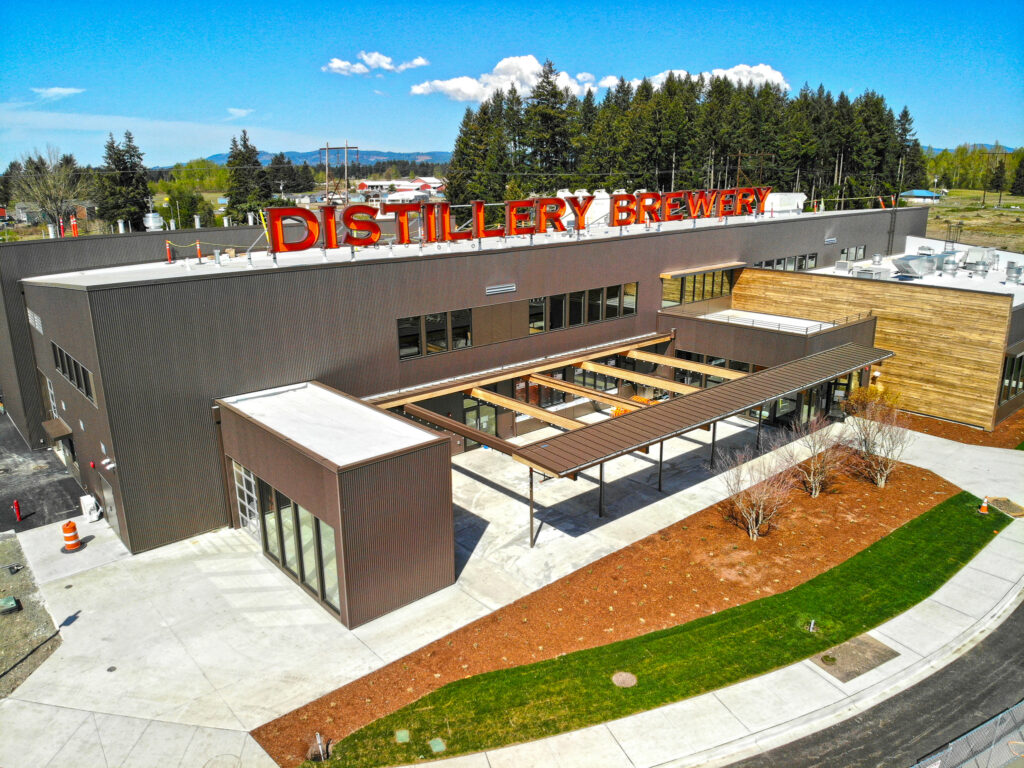 the outside of a distillery and brewery arial shot